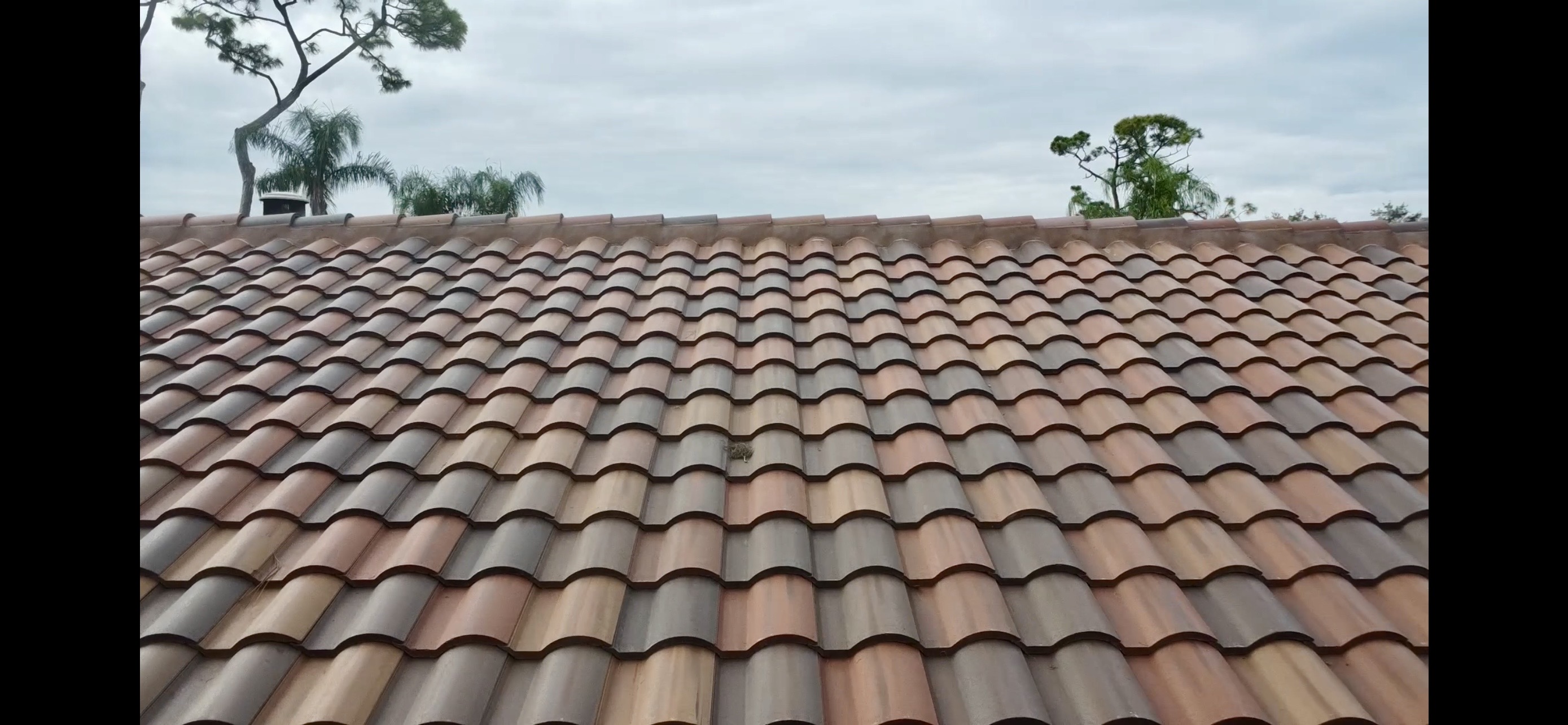 Stone coated metal tile roof close-up