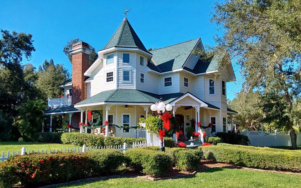 Two-story home with a shingle roof